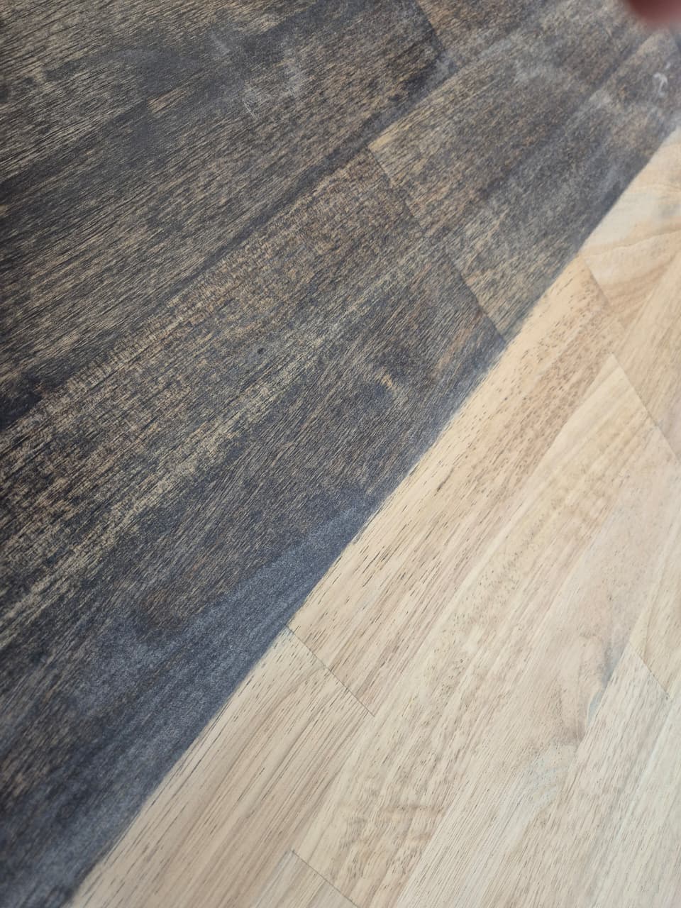 Rubber wood top finish sample — natural and dark stained wood grain