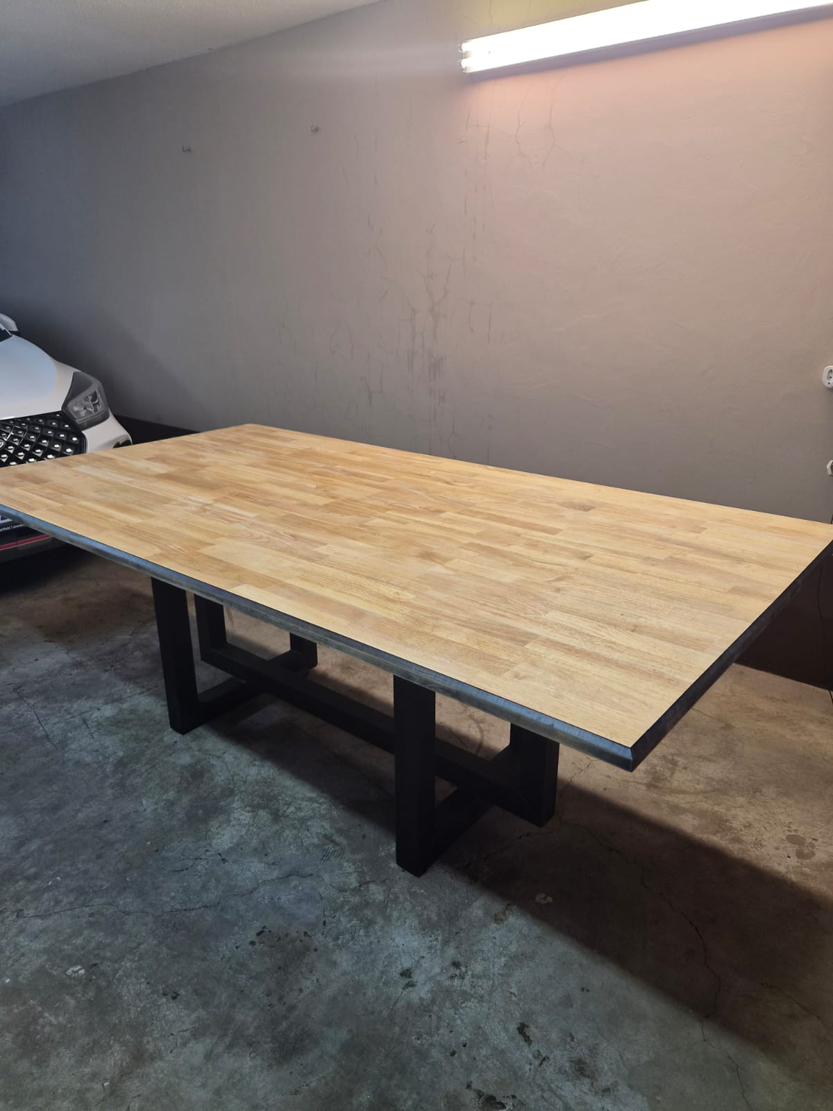 The Ascend Table — Rubber Wood — natural wooden top on a black iron base